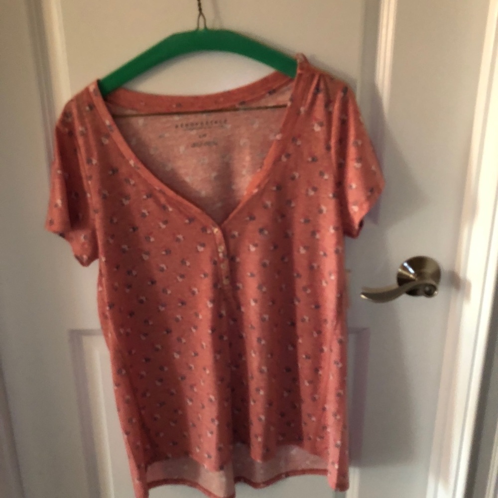 Pink tee shirt with small flowers